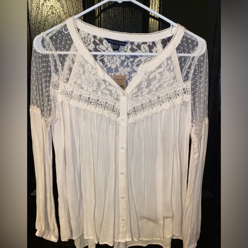 American Eagle long sleeved lace shouldered blouse.